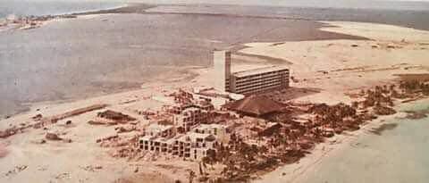 The first hotels rising on the empty sandbar in the early 1970s