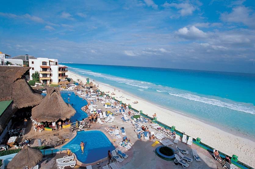 The pools, palapas and beach of El Pueblito